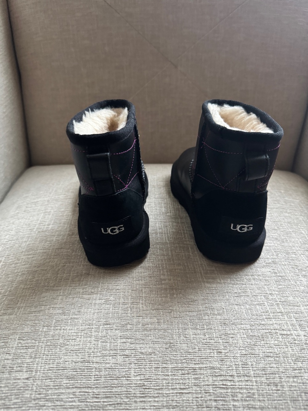 UGG Black Short Shearling Boots with Pink Stitching